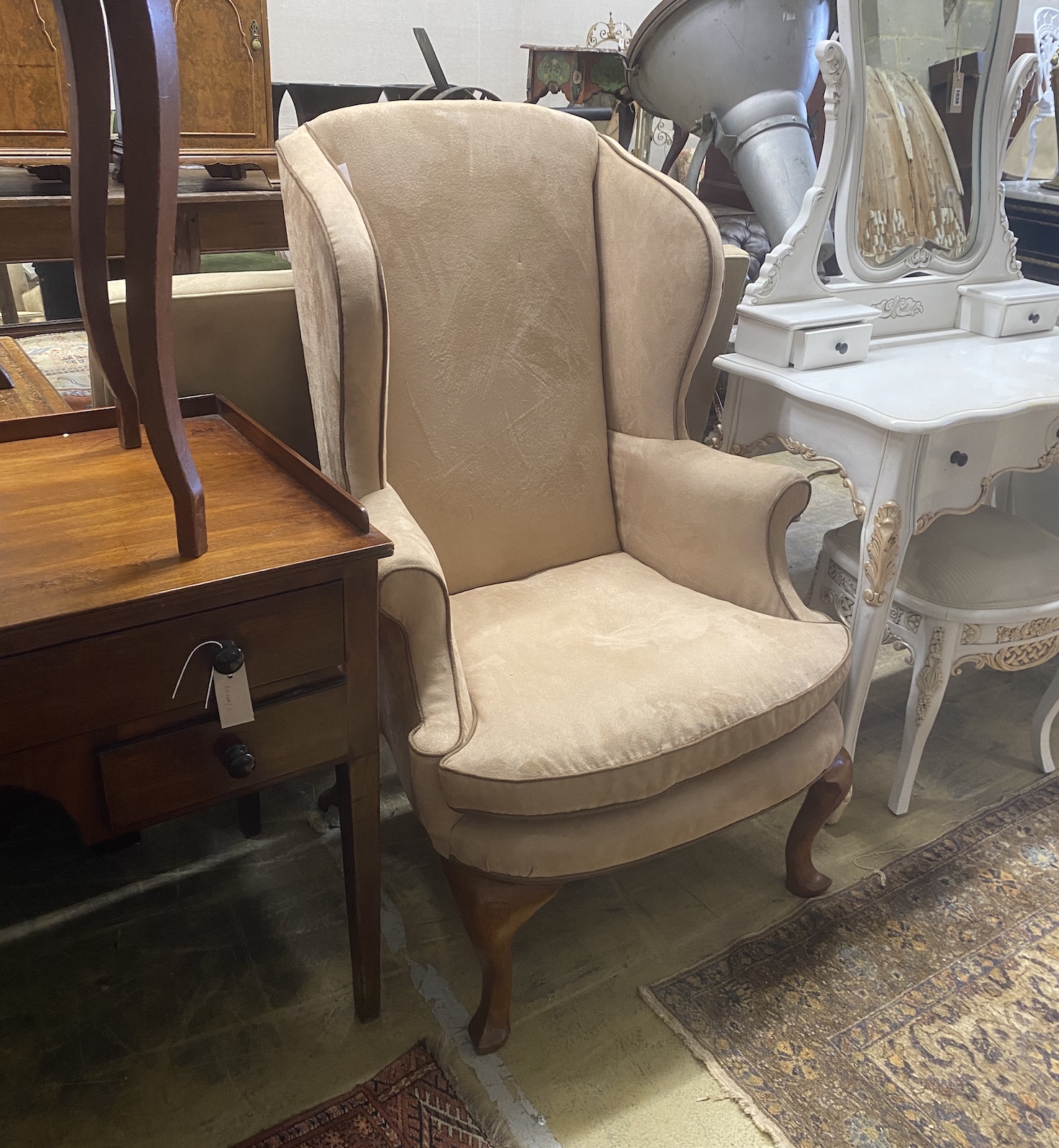 A George I style wing armchair upholstered in faux suede fabric, width 78cm, depth 70cm, height 118cm